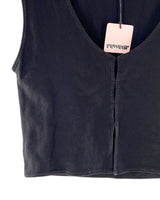 Top sleeveless con aberturas