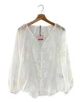 Blusa con cierre chino