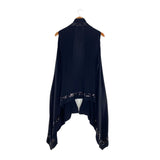 Capa sleeveless tejido