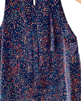 Blusa sleeveless con vuelo