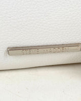Bolso clutch mini con textura