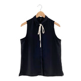 Blusa sleeveless abotonada