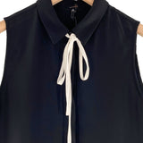Blusa sleeveless abotonada