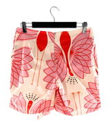 Short con capa anudada