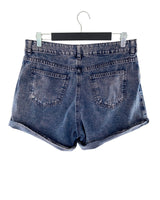Short mini en denim rigido