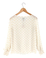 Blusa con textura y  plumet