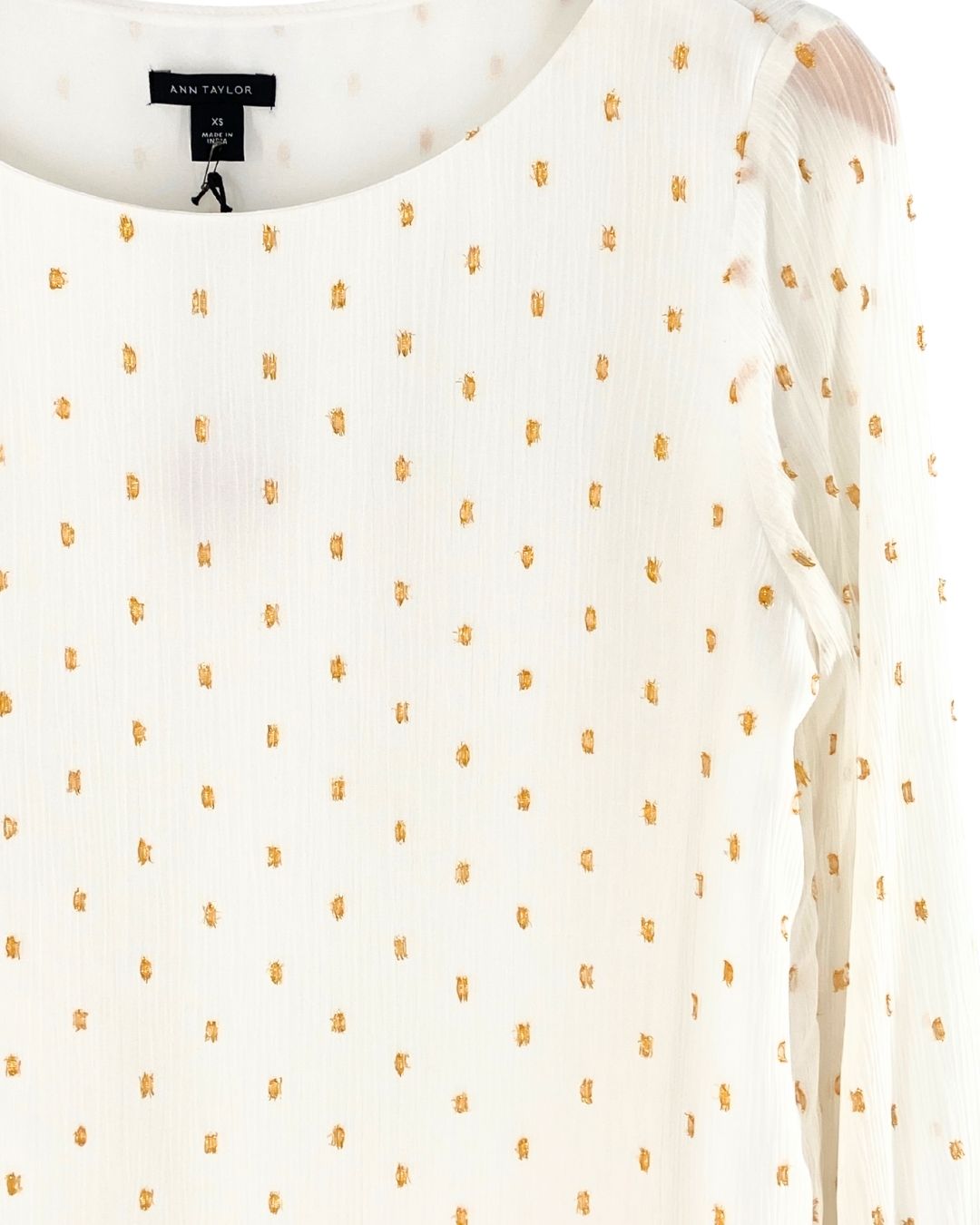 Blusa con textura y  plumet