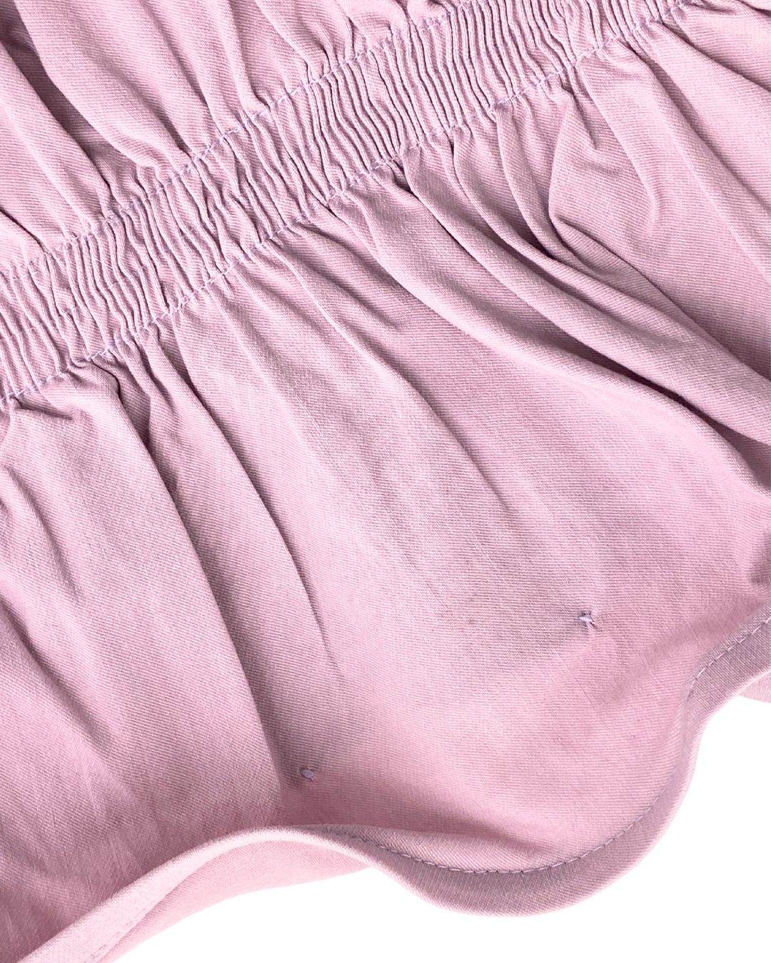 Crop top strapless con vuelo