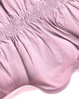 Crop top strapless con vuelo