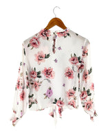 Blusa  print flores anudada