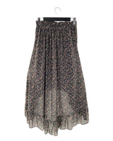 Falda traslucida asimetrica