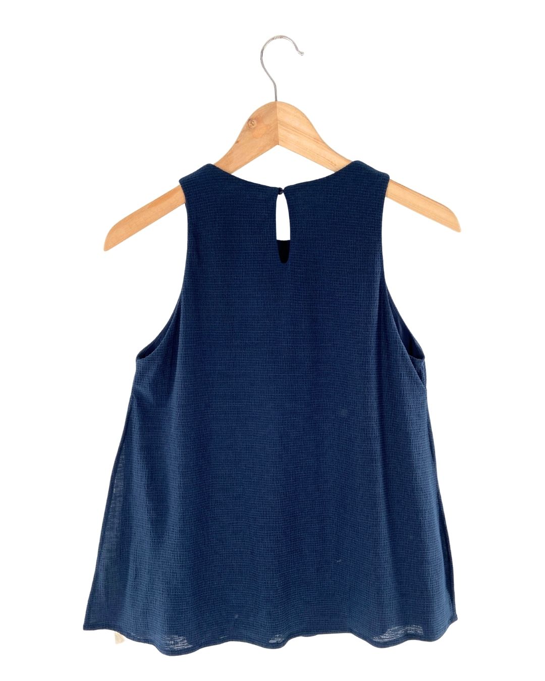 Blusa sleeveless amplia