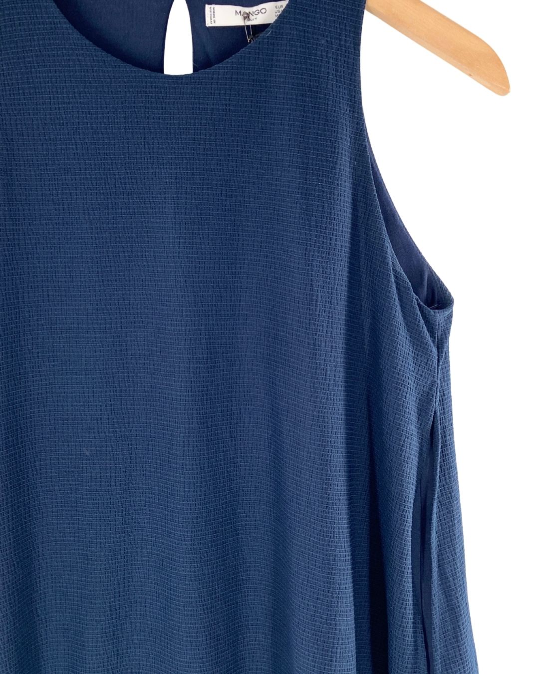 Blusa sleeveless amplia