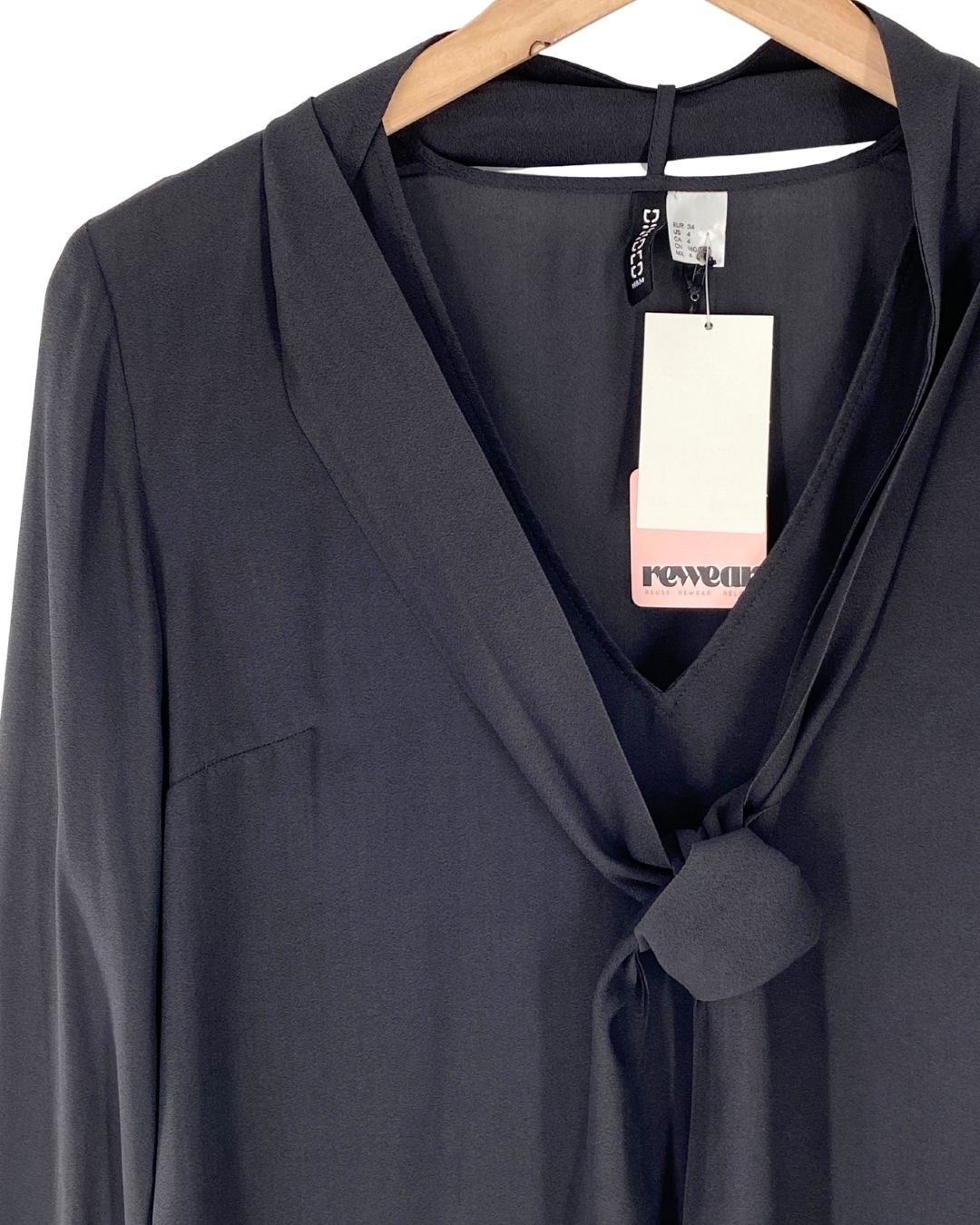 Blusa traslucida anudada