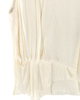 Blusa con textura asimetrica