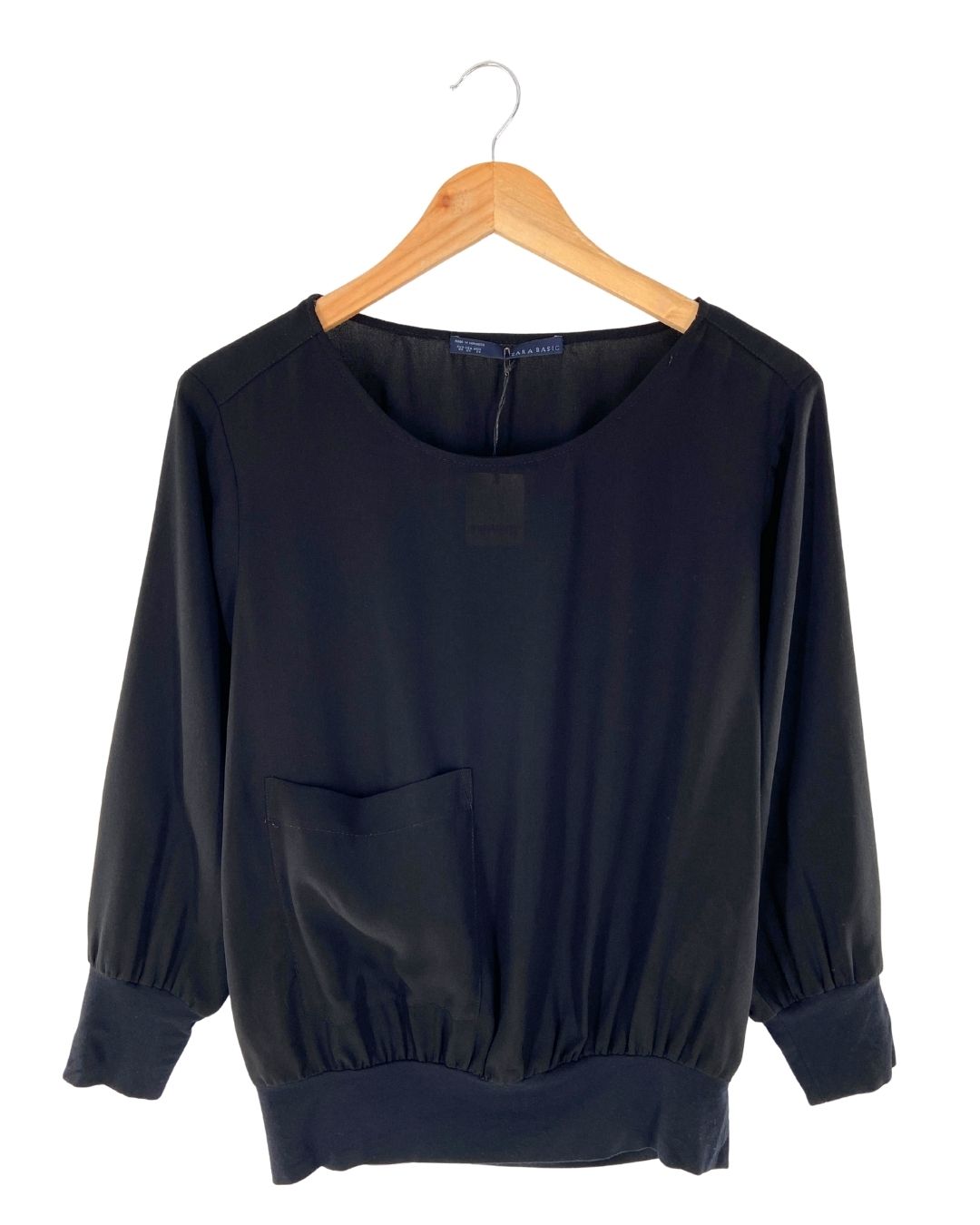 Blusa traslucida manga larga