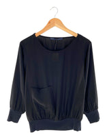 Blusa traslucida manga larga