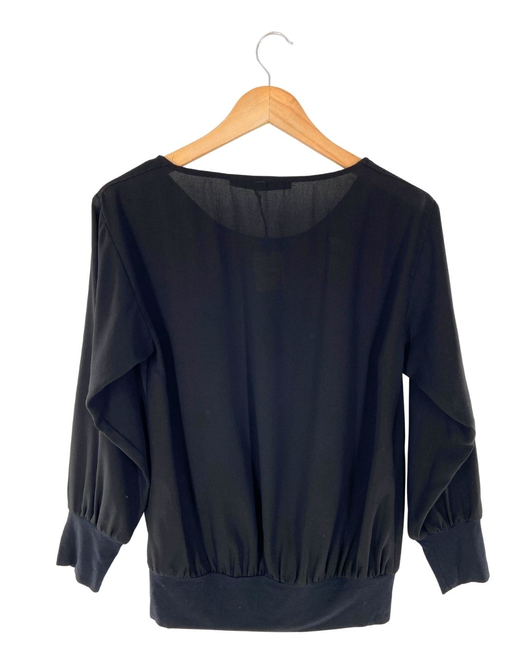 Blusa traslucida manga larga