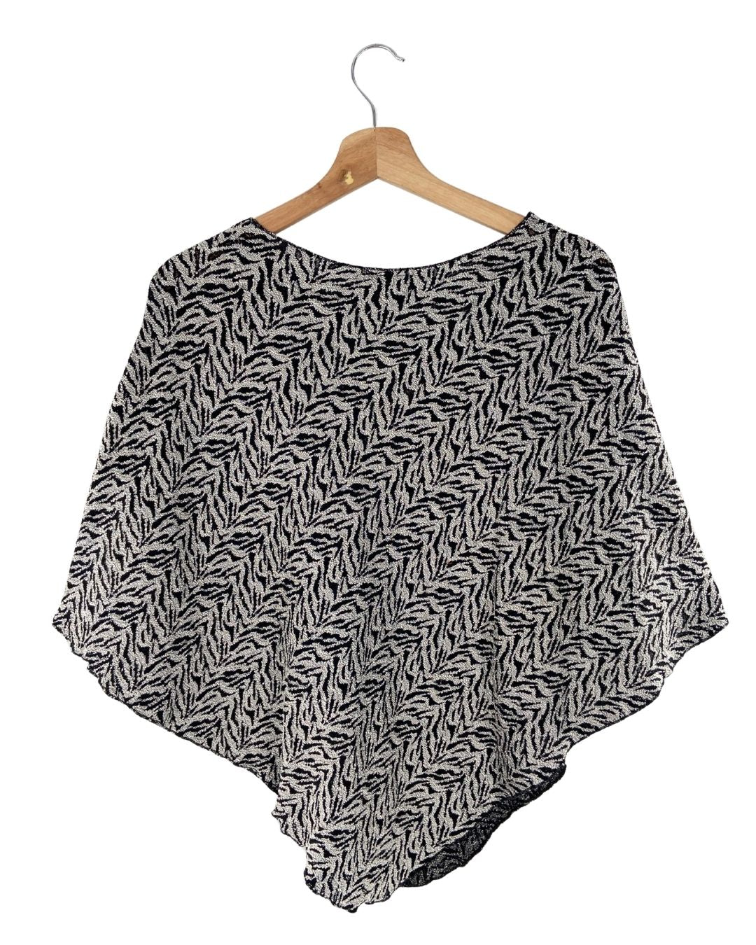 Blusa tejida tipo capa