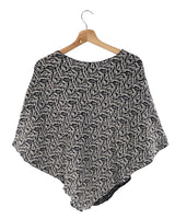 Blusa tejida tipo capa