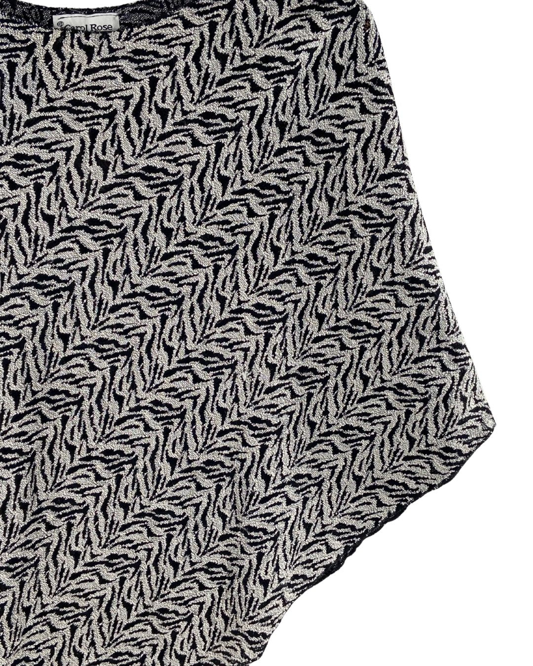 Blusa tejida tipo capa