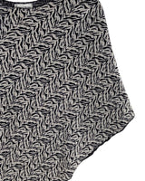 Blusa tejida tipo capa