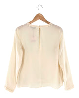 Blusa traslucida con detalles