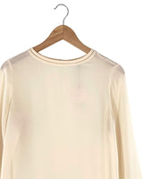 Blusa traslucida con detalles