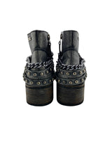 Botines en cuero con taches