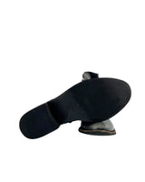 Botines en cuero con taches