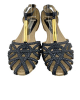 Sandalias planas con detalle