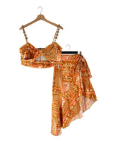 Top de tiras y falda