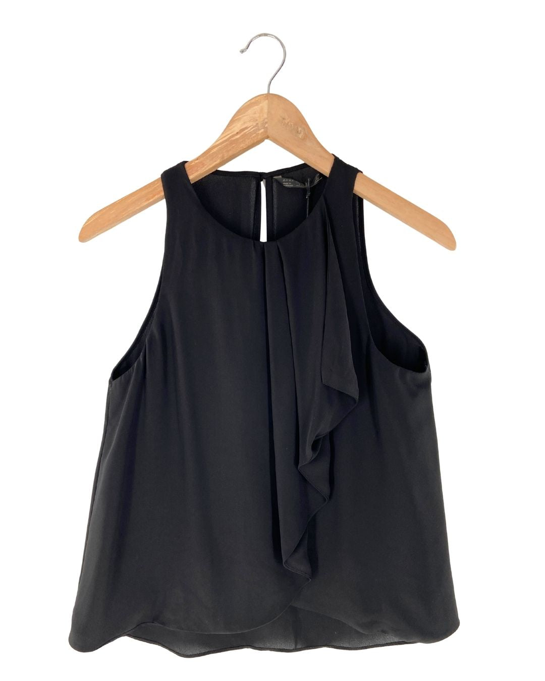 Blusa sleeveless con vuelo