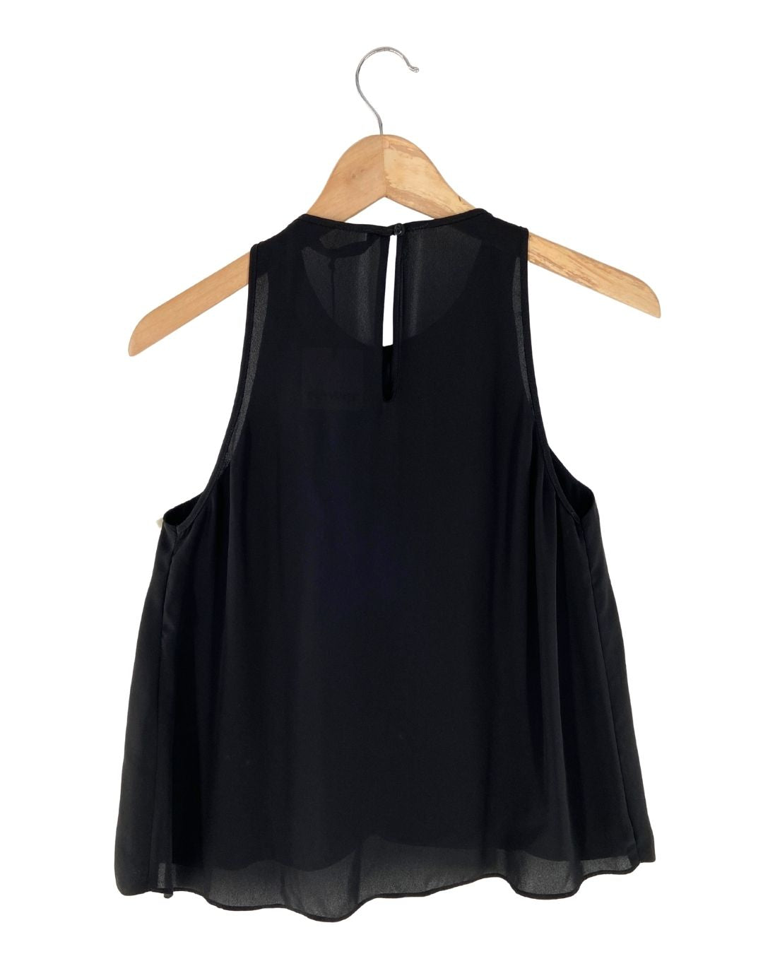 Blusa sleeveless con vuelo
