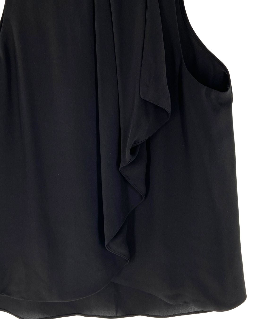 Blusa sleeveless con vuelo