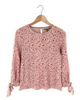 Blusa en blonda anudada