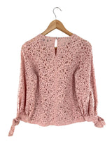 Blusa en blonda anudada