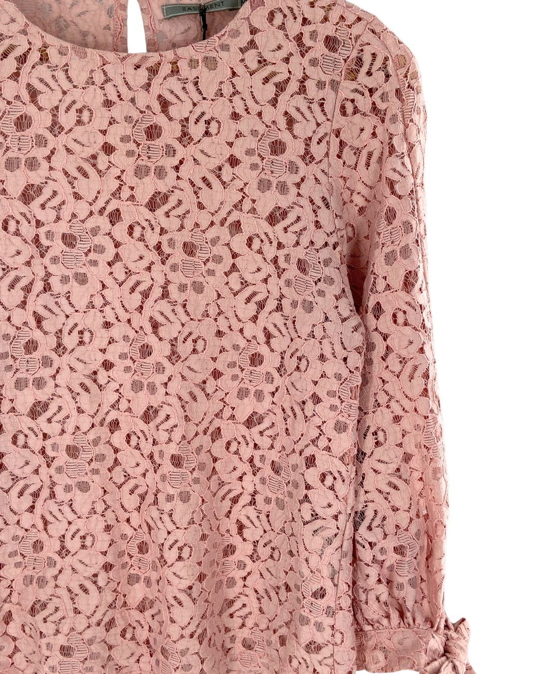 Blusa en blonda anudada