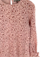 Blusa en blonda anudada
