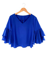 Blusa con vuelos manga