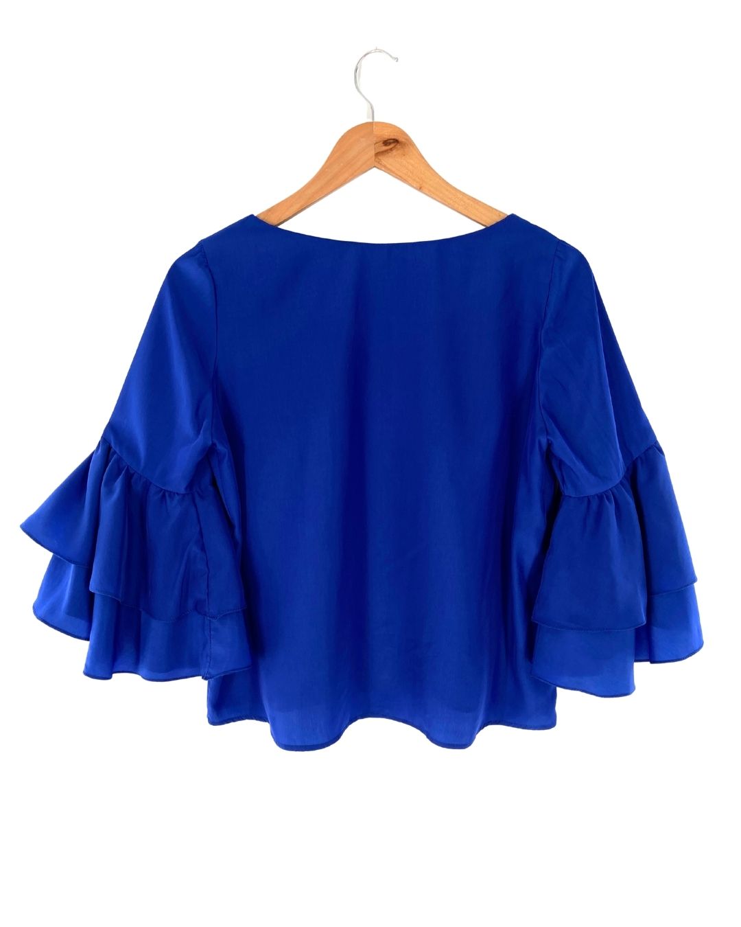 Blusa con vuelos manga