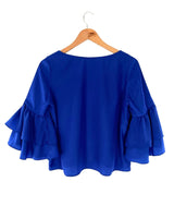 Blusa con vuelos manga