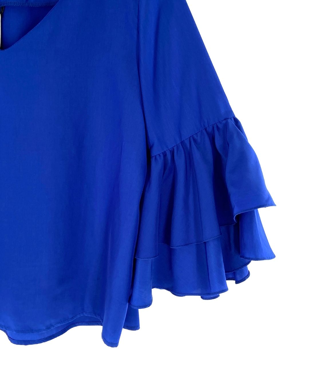 Blusa con vuelos manga