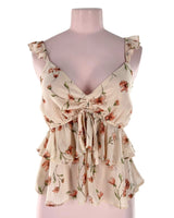 Blusa crop de tiras con vuelos