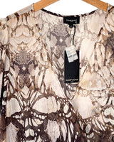 Blusa traslucida encauchada