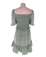 Vestido midi encauchado print