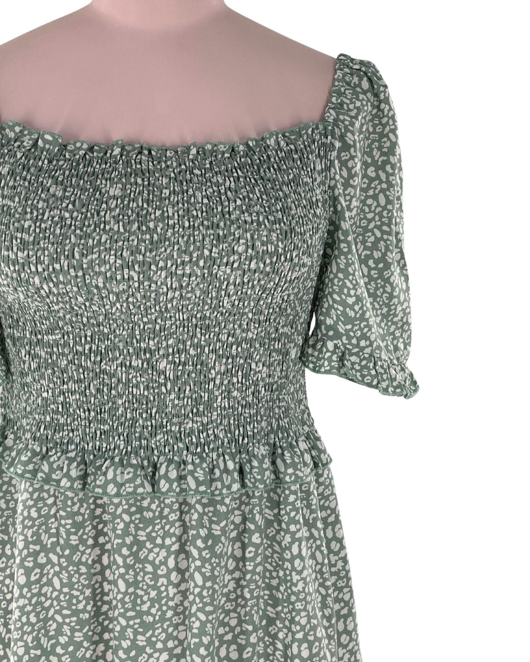 Vestido midi encauchado print