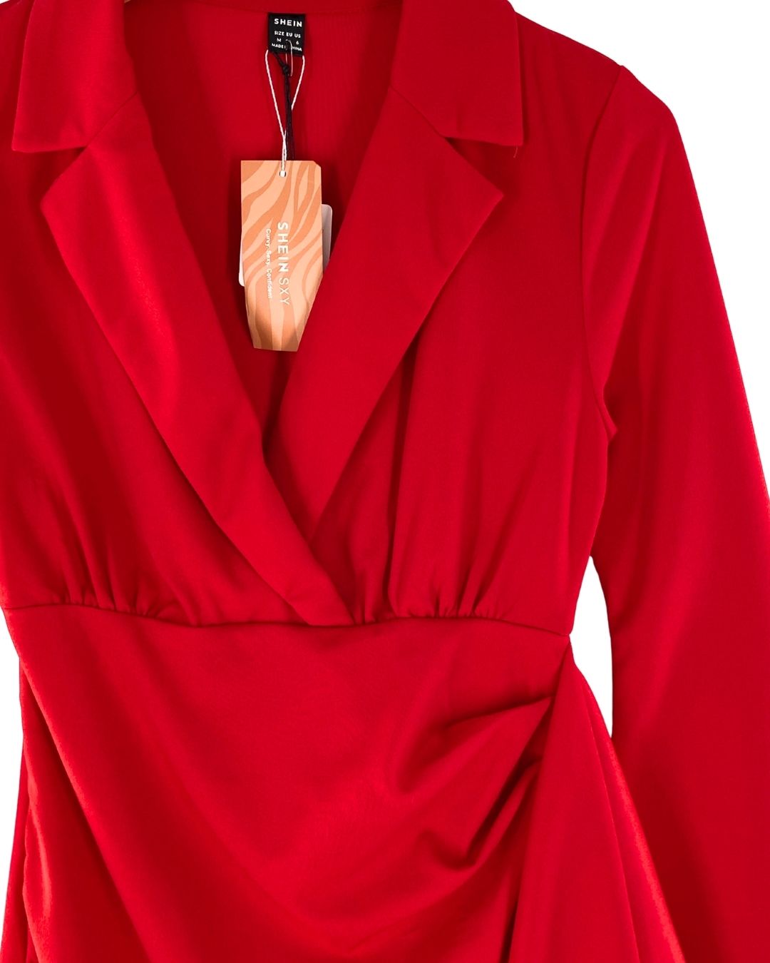 Vestido midi con vuelo y puños