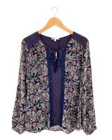 Blusa manga larga anudada