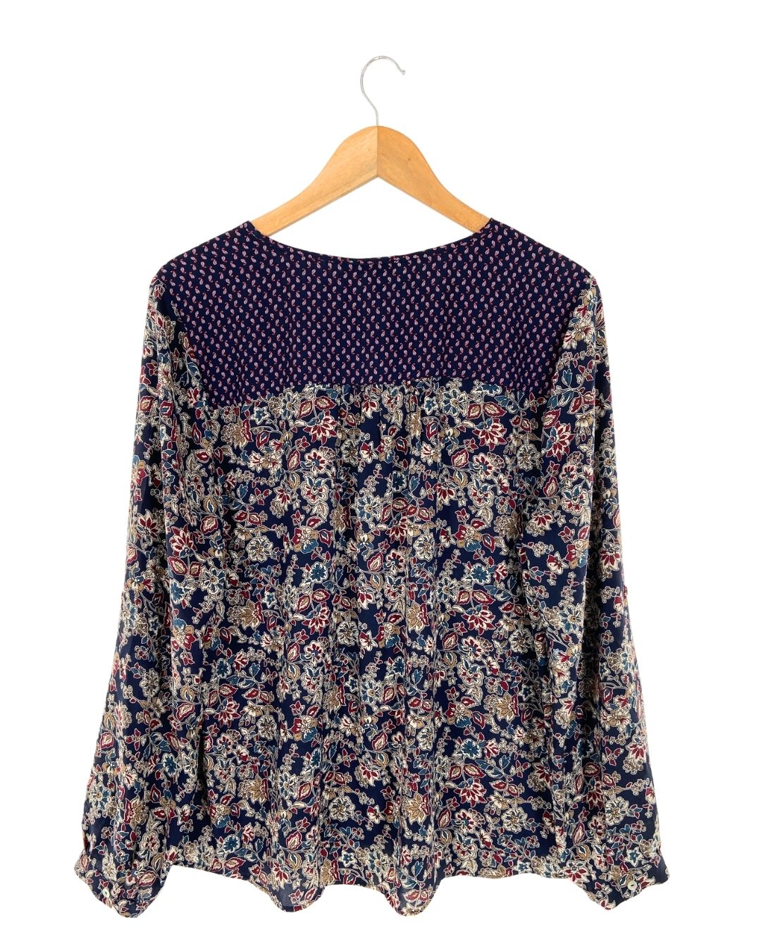 Blusa manga larga anudada